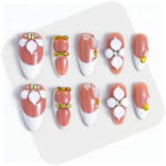 Peach Whisper -Soft Peach Short Almond Press-Ons with 3D Flower, Gold Bow & French Tip Detail