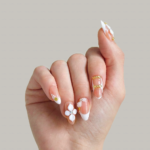 Peach Whisper -Soft Peach Short Almond Press-Ons with 3D Flower, Gold Bow & French Tip Detail - Image 2