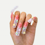 Blossom Glitz -Soft Coral Short Curved Press-Ons with Micro Floral & Iridescent Glitter - Image 2