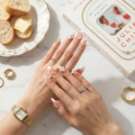 Peach Whisper -Soft Peach Short Almond Press-Ons with 3D Flower, Gold Bow & French Tip Detail - Image 3