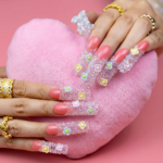 Blossom Glitz -Soft Coral Short Curved Press-Ons with Micro Floral & Iridescent Glitter - Image 3