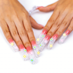 Blossom Glitz -Soft Coral Short Curved Press-Ons with Micro Floral & Iridescent Glitter - Image 5