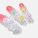 Blossom Glitz -Soft Coral Short Curved Press-Ons with Micro Floral & Iridescent Glitter - Image 6